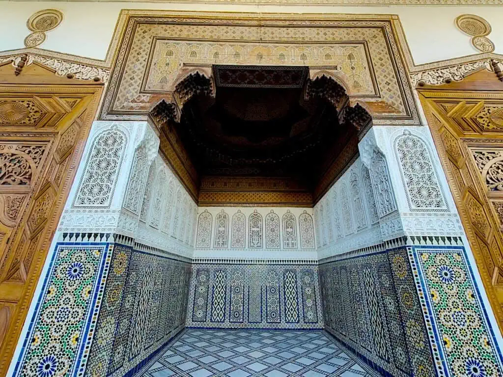 View of the amazing tile work, plaster work, and wood work of the Saadian tombs in Marrakech.