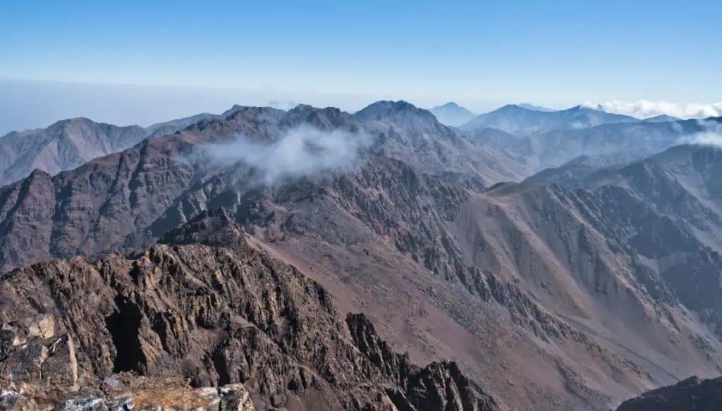 Panoramic view of the mountains in and around Toubkal on a sunny day.