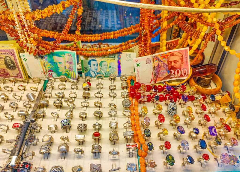 Aerial view of rings and jewerly and money and necklaces for sale at a shop in Casabarata.