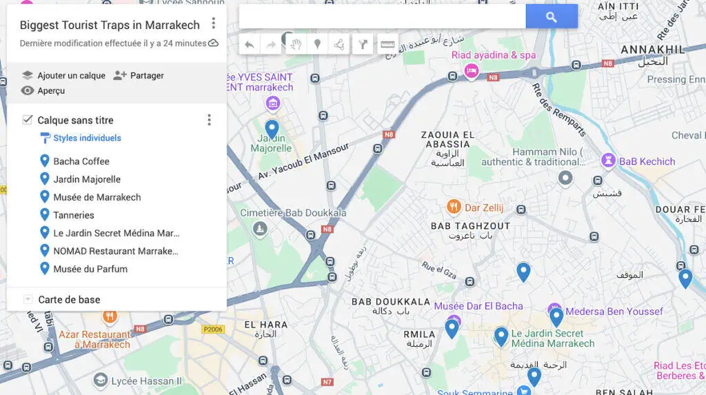Map of the seven biggest tourist traps in Marrakech with blue dots to represent all of the places to avoid.