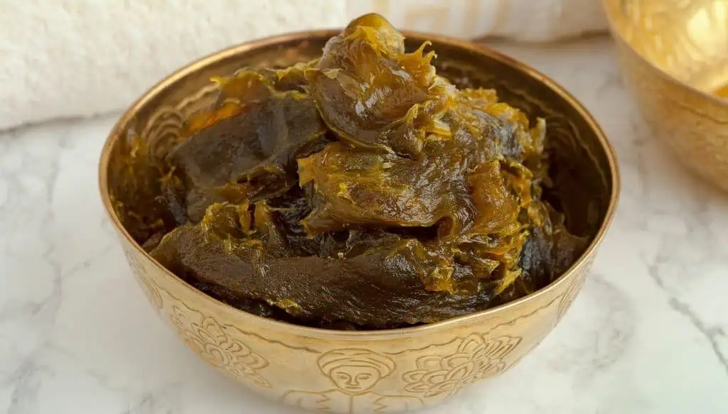 View of a bowl full of Savon Beldi inside a hammam in Marrakech.